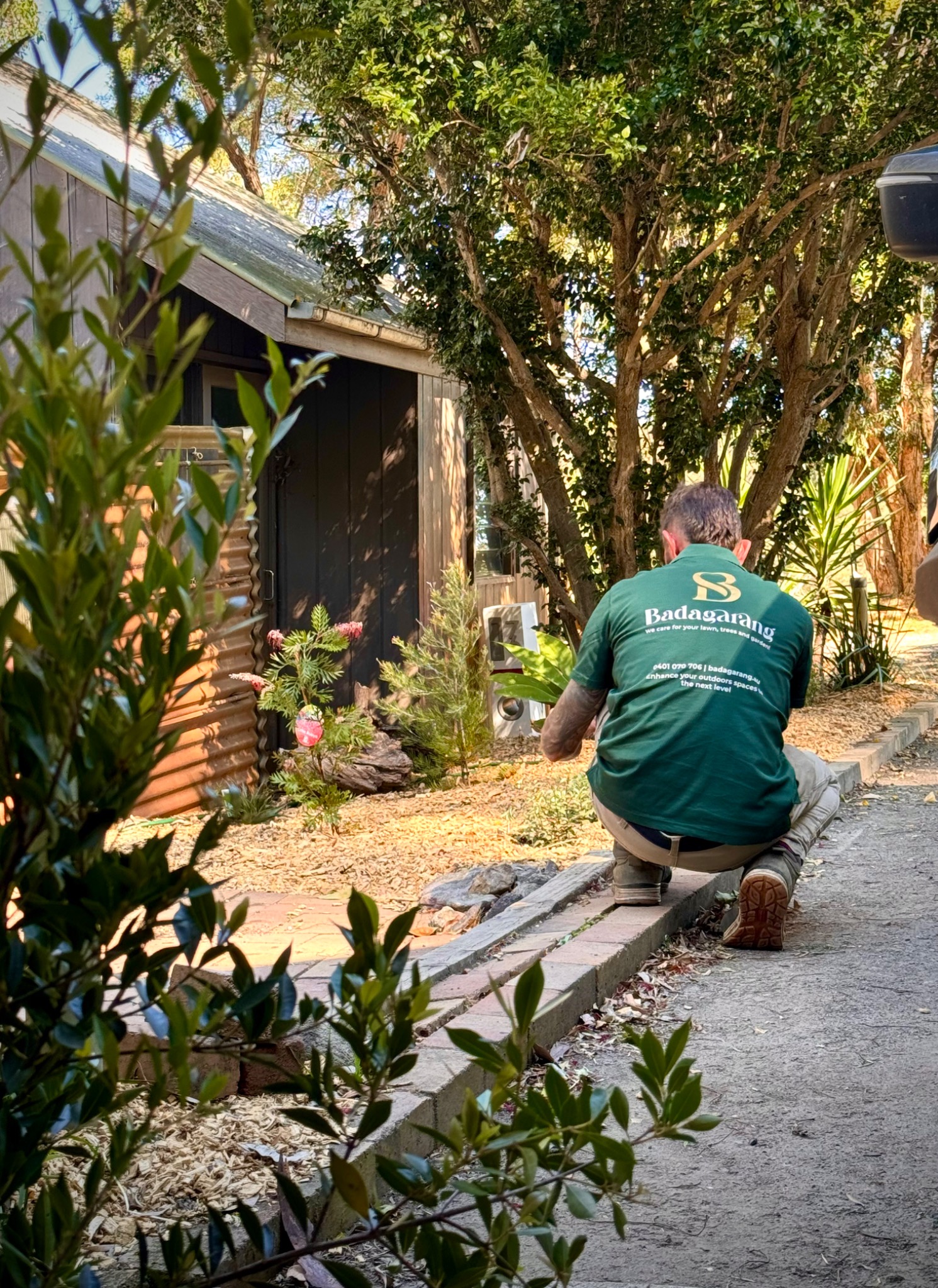 Badagarang gardener working quietly within a garden